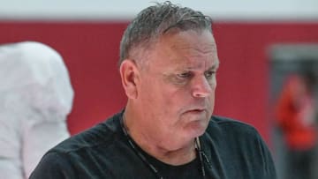 Arkansas Razorbacks coach Sam Pittman working with the offensive line in a spring practice on April 4 at the indoor facility in Fayetteville, Ark.