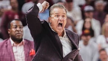 Arkansas Razorbacks coach John Calipari screams from the sidelines against the Texas Longhorns at Bud Walton Arena in Fayetteville, Ark.