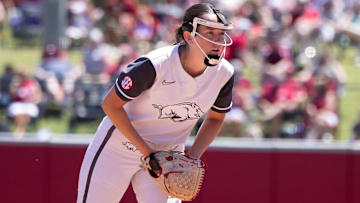 Arkansas Razorbacks pitcher Robyn Herron looks in before a pitch against the Oklahoma State Cowgirls in an NCAA Regional at Bogle Park