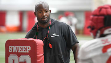 Arkansas Razorbacks running backs coach Kolby Smith during drills in practice at the indoor center in Fayetteville, Ark.,, on Thursday.
