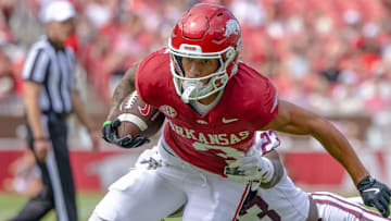 Arkansas Razorbacks wide receiver CJ Brown breaking a tackle against the Alabama A&M Bulldogs at Razorback Stadium in Fayetteville, Ark.