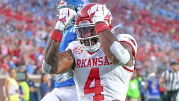 Arkansas Razorbacks running back Mike Washington celebrates after scoring against the Ole Miss Rebels at Vaught-Hemingway Stadium in Oxford, Miss.
