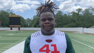 Melbourne Central Catholic tackle Javeion Cooper is leaning towards playing his college football at Clemson, but still has interest in Syracuse, among others.