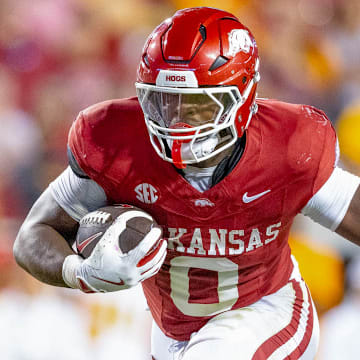 Arkansas Razorbacks running back Braylen Russell runs for a big gain against the Tennessee Volunteers at Razorback Stadium in Fayetteville, Ark.