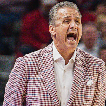 Arkansas Razorbacks coach John Calipari yells from the sidlines against the LSU Tigers at Bud Walton Arena in Fayetteville, Ark.