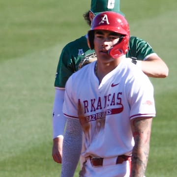 Arkansas Razorbacks shortstop Wehiwa Aloy on second base in first inning against the Charlotte 49ers at Baum-Walker Stadium in Fayetteville, Ark