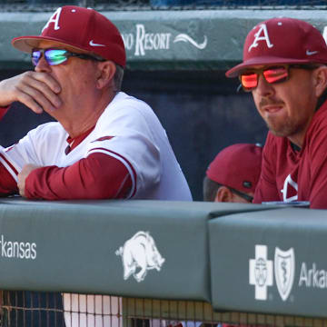 Arkansas Razorbacks coach Dave Van Horn in the dugout against the Charlotte 49ers at Baum-Walker Stadium in Fayetteville, Ark.
