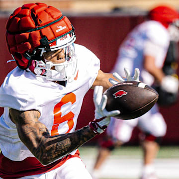 Arkansas Razorbacks wide receiver Raylen Sharpe makes a catching during a spring practice on the outdoor practice fields in Fayetteville, Ark.