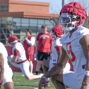 Arkansas Razorbacks wide receiver O'Mega Blake loosening up before a spring practice on the outdoor fields in Fayetteville, Ark.