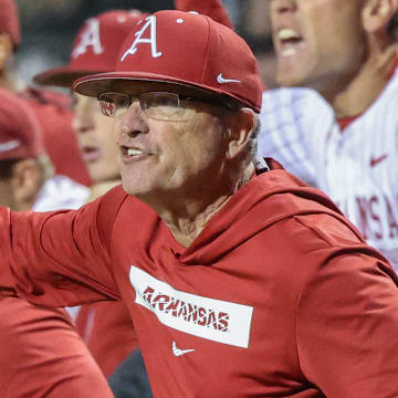 Arkansas Razorbacks coach Dave Van Horn yelling from the dugout in a game against the Texas Longhorns at Baum-Walker Stadium in Fayetteville, Ark.