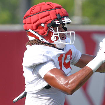 Arkansas Razorbacks wide receiver Antonio Jordan makes a catch during fall camp practices on the outdoor practice fields in Fayetteville, Ark.