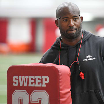 Arkansas Razorbacks running backs coach Kolby Smith during drills in practice at the indoor center in Fayetteville, Ark.,, on Thursday.