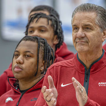 Arkansas Razorbacks and coach John Calipari at Care Society event in Springdale on Friday before their exhibition game with Cincinnati at Bud Walton Arena.