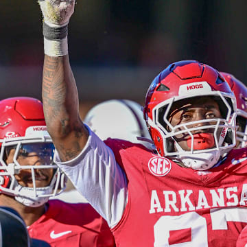 Arkansas Razorbacks defensive lineman Quincy Rhodes after a stop against the Mississippi State Bulldogs at Razorback Stadium in Fayetteville, Ark.