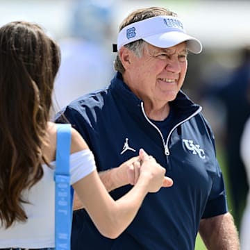 Jordon Hudson and Bill Belichick made headlines with a quiet sideline conversation over the weekend. 