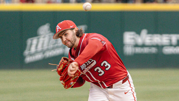 Razorbacks pitcher Zach Root delivers a pitch against Washington State on Friday afternoon in the second game