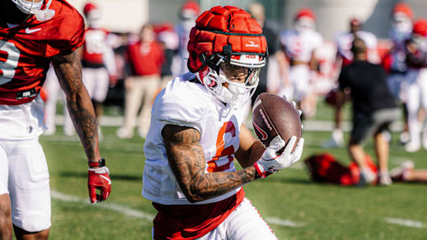 Razorbacks wide receiver Raylen Sharpe makes a catching during a spring practice