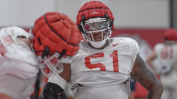 Arkansas Razorbacks offensive lineman Corey Robinson III at Thursday morning's media viewing section of practice