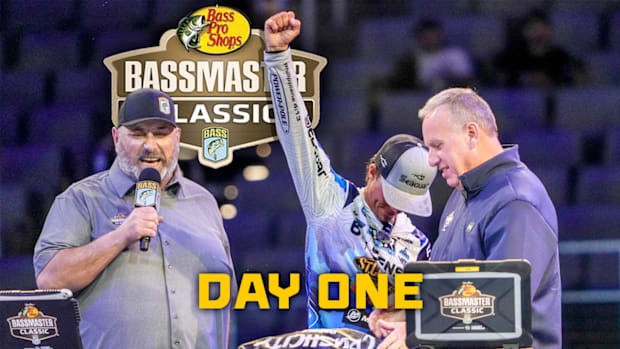 Try McKinney on stage with Dave Mercer celebrating the lead in his first Bassmaster Classic