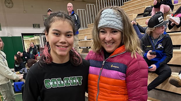 Amelia Fawcett with Maria Cramer after taking first place in the regional tournament in Alaska.