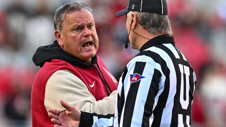 Arkansas Razorbacks coach Sam Pittman argues with an official in a game Nov. 24, 2023, against the Missouri Tigers in Razorback Stadium in Fayetteville, Ark.