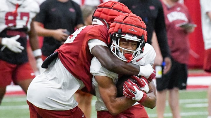 Arkansas Razorbacks wide receiver Isaiah Sategna after making a catch in practice last year at the outdoor practice fields in Fayetteville, Ark.