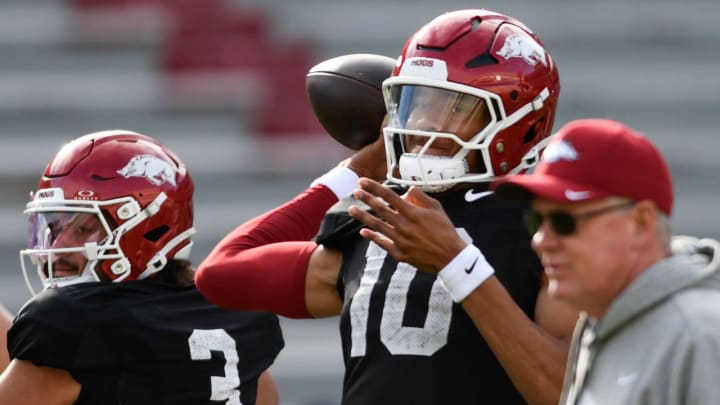 Arkansas Razorbacks quarterbacks Malachi Singleton and Taylen Green during passing drills at a spring practice inside Razorback Stadium in Fayetteville, Ark.