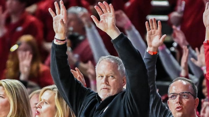 Arkansas Razorbacks athletics director Hunter Yurachek calling the Hogs at a basketball game against Texas A&M.