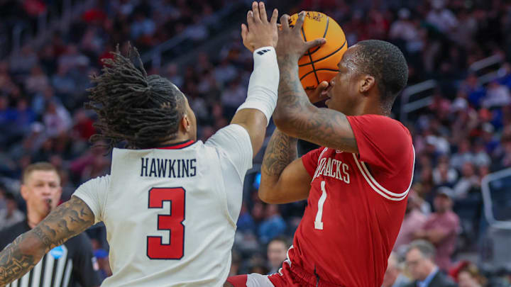Arkansas Razorbacks guard Johnell Davis drives for a layup against the Texas Tech Red Raiders in the Sweet 16.