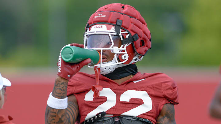 Arkansas Razorbacks defensive back Caleb Wooden taking a break during preseason practices on the outdoor fields in Fayetteville, Ark. Arkansas Razorbacks defensive back Caleb Wooden taking a break during preseason practices on the outdoor fields in Fayetteville, Ark.