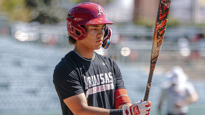 Arkansas right fielder Kuhio Aloy holds the bat during an intrasquad scrimmage Arkansas right fielder Kuhio Aloy holds the bat during an intrasquad scrimmage