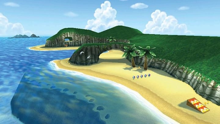 A beach with grassy cliffs arching over it in Mario Kart 64.