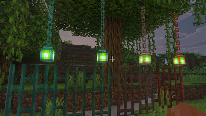 Copper chains, lanterns, and bars all in various states of oxidation.