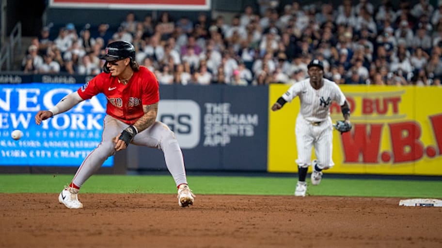 Jarren Duran almost got caught sleeping, but Anthony Volpe did not get the ball to Jazz Chisholm Jr. in time to tag him. | Photo by Benjamin B. Braun / Getty Images