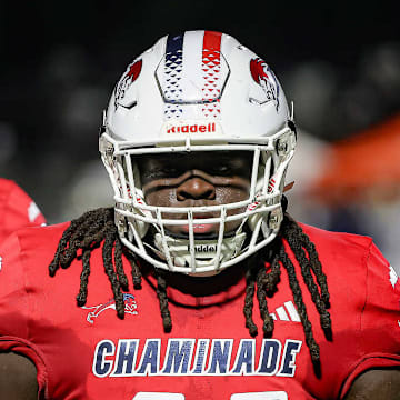 Chaminade-Madonna offensive linemen Damani Atkinson (right) and Ekeem Atehortua, along with their teammates, look to climb out from under an 0-2 start when they host American Heritage, in a battle of South Florida powers, Friday night.