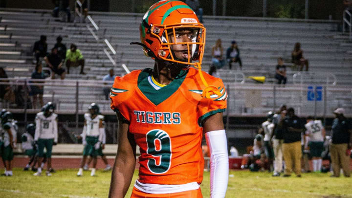 Blanche Ely quarterback Omari McNeal scored the game winning touchdown in overtime as  Blanche Ely stunned nationally ranked Chaminade-Madonna, 35-34.