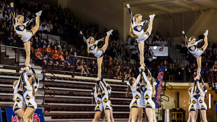 The Stoney Creek cheerleading squad performs at the Michigan state championships in February where the Cougars won their second straight state title. It was also the third straight year that teams from the Rochester metro area placed 1-2-3 at the event, underscoring the area's dominance of the sport in Michigan. The Stoney Creek cheerleading squad performs at the Michigan state championships in February where the Cougars won their second straight state title. It was also the third straight year that teams from the Rochester metro area placed 1-2-3 at the event, underscoring the area's dominance of the sport in Michigan.