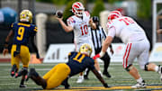 Mater Dei quarterback Ryan Hopkins leans into a passing lane during his team's win over St. Thomas Aquinas at the 2025 Broward County National Football Showcase. Mater Dei prevailed 26-23 to hold on to the No. 1 spot in the California High School state rankings after Week 0 games. 