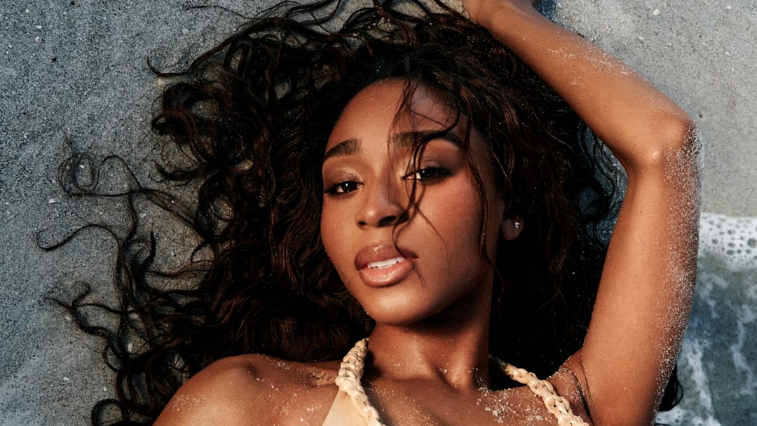 Normani was photographed by Katherine Goguen on Captiva Island, Fla. Swimsuit by Solara Official.