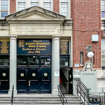 James Madison high school in Brooklyn, New York where a former football coach stands accused of brutally beating a a 14-year old student athlete in a school stairwell.