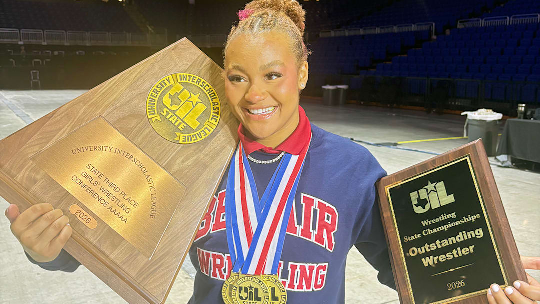 El Paso Bel Air's Cydney Davis is all smiles as she shows off her team's third-place trophy, her three gold medials and the UIL 5A Outstanding Wrestler Plaque after winning her third UIL 5A state championship. El Paso Bel Air's Cydney Davis is all smiles as she shows off her team's third-place trophy, her three gold medials and the UIL 5A Outstanding Wrestler Plaque after winning her third UIL 5A state championship.