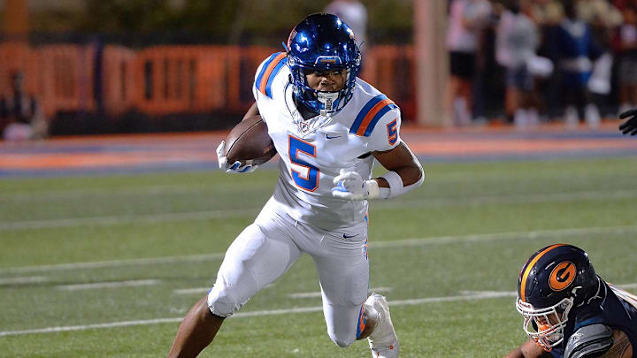 Amir Tillman (5) of East St. Louis (Ill.) avoids pressure from a Bishop Gorman (Nev.) defender.