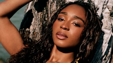 Normani was photographed by Katherine Goguen on Captiva Island, Fla. Swimsuit by OYE Swimwear.