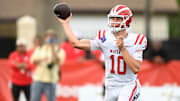 Mater Dei quarterback Ryan Hopkins releases a throw in his team's 23-20 win over St. Thomas Aquinas to open the season; He threw four more TD passes in the second half and five overall in his team's wild 36-31 win at top-ranked St. John Bosco on Friday night.