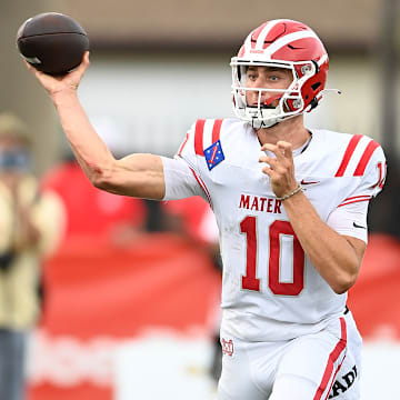 Mater Dei quarterback Ryan Hopkins releases a throw in his team's 23-20 win over St. Thomas Aquinas to open the season; He threw four more TD passes in the second half and five overall in his team's wild 36-31 win at top-ranked St. John Bosco on Friday night.