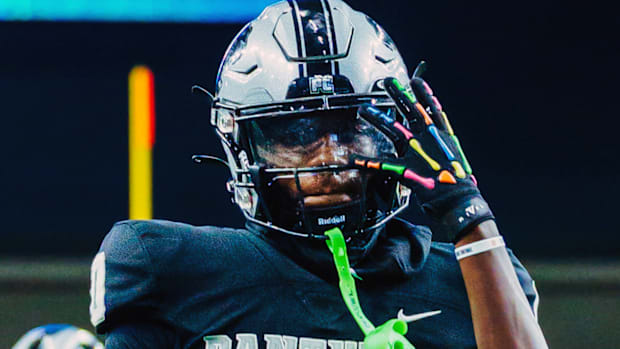 Panther Creek's Jalen Lott, one of the nation's top wide receivers, has committed to the University of Oregon.
