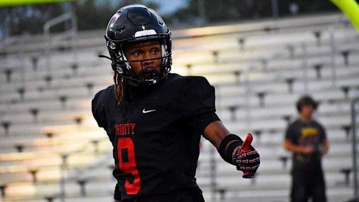 Euless Trinity cornerback John Meredith III guards a Midland Lee player in a game in Week 1 this high school season. 
