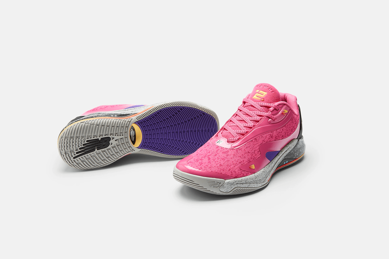 Side view of Kawhi Leonard's pink and grey New Balance sneakers.
