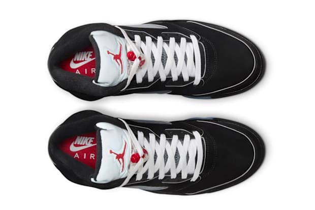 View of black and silver Air Jordan sneakers.