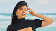 Lauren Chan was photographed by Yu Tsai in Mexico. Swimsuit by Swimsuit by Pursuit the Label. Earrings by IPPOLITA Bracelet by Alexis Bittar